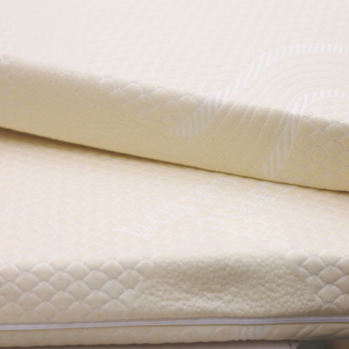 Bright organic cotton cover wrapped around natural latex topper, chemical-free and breathable