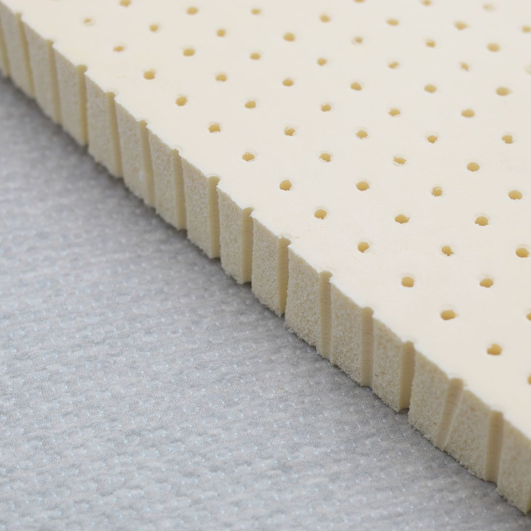 Pinhole organic latex topper paired with heather grey organic cotton cover, supportive and stylish