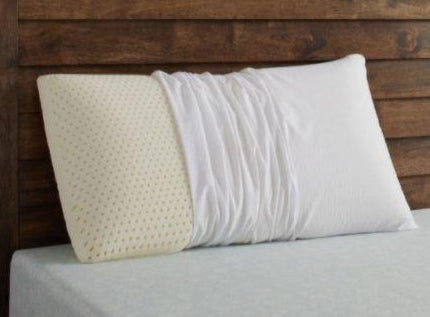 Stacked natural Talalay latex pillows – soft, medium, and firm options displayed for sleep comfort and spinal alignment