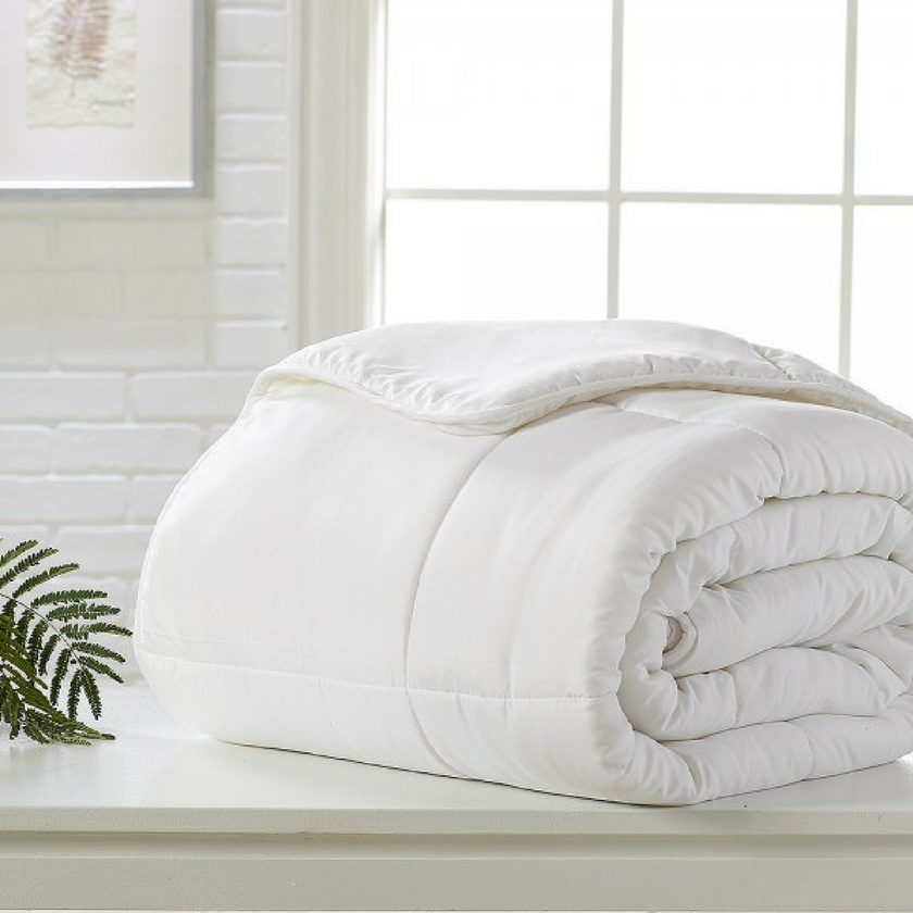 Rolled up alternative down comforter. with stitching pattern
