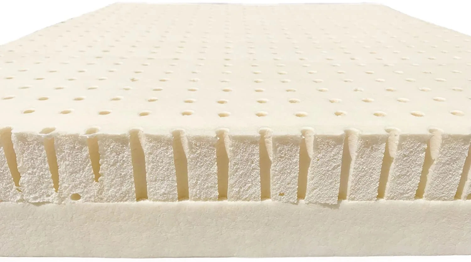 soft and firm latex mattress topper. Soft is on the top showing the pin holes, and bottom showing the second firmness firm. For multiple comfortability 