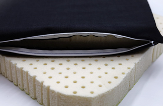 black denim cotton cover on 2" latex seat cushion with pinholes for ventilation.