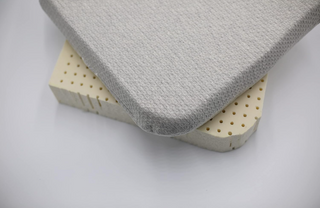 heather grey cotton cover with texture print on top of pin holed 3 inch organic latex seat cushion with ventilation for coolness